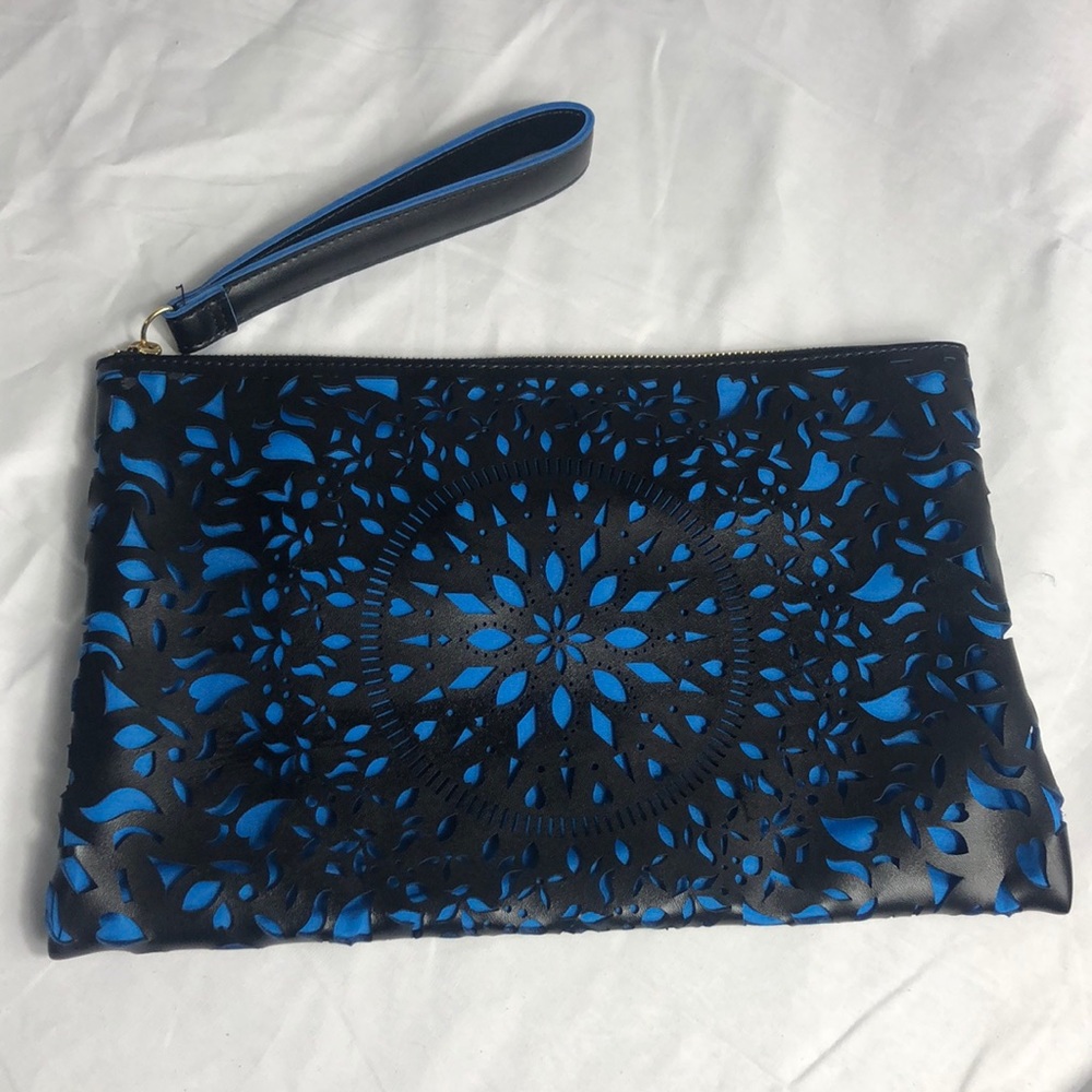 CARLOS BY Carlos Santana wristlet
